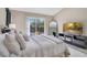 Spacious bedroom features a built-in fireplace and sliding glass door to the lanai at 2406 Placid Way, Kissimmee, FL 34758