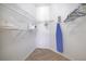 Walk-in closet features custom shelving and storage space for all your wardrobe needs at 2406 Placid Way, Kissimmee, FL 34758