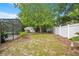 The spacious backyard offers a storage shed, garden beds, mature trees and is adjacent to the pool area at 2901 Autumnwood Trl, Apopka, FL 32703