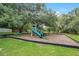 Well-maintained playground area with modern equipment and ample space for recreation at 2901 Autumnwood Trl, Apopka, FL 32703