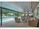 Enclosed pool area with outdoor seating and a brick pizza oven at 2901 Autumnwood Trl, Apopka, FL 32703
