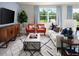 Stylish living room with comfortable seating, modern decor, and plenty of natural light at 3210 Viceroy Ct, Poinciana, FL 34759