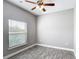 Bedroom featuring a ceiling fan and bright natural light at 344 Buenaventura Blvd, Kissimmee, FL 34743