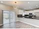 Bright, spacious kitchen with modern appliances and sliding door at 344 Buenaventura Blvd, Kissimmee, FL 34743