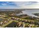 Scenic aerial view showcasing the estate, a network of lakes, and the surrounding upscale community at 4071 Isabella Cir, Windermere, FL 34786