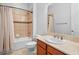 Bathroom featuring decorative tile shower, vanity, and ceramic tile flooring at 4071 Isabella Cir, Windermere, FL 34786
