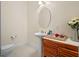 Bathroom featuring contemporary vanity, pedestal sink, and decorative accents at 4071 Isabella Cir, Windermere, FL 34786