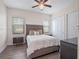 Cozy bedroom featuring a comfortable queen-sized bed and ample closet space at 4071 Isabella Cir, Windermere, FL 34786