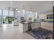Open floor plan with a large kitchen island and seamless connection to the living area at 4071 Isabella Cir, Windermere, FL 34786