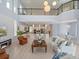 Expansive living area featuring a modern kitchen, dining space, and comfortable seating, perfect for entertaining at 4071 Isabella Cir, Windermere, FL 34786