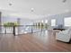 Spacious loft area with a TV, seating, and a view of the front yard at 4071 Isabella Cir, Windermere, FL 34786