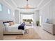 Spacious main bedroom with tray ceilings, chandelier, and sitting area at 4071 Isabella Cir, Windermere, FL 34786