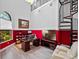 Home office with a spiral staircase and a large window for natural light at 4071 Isabella Cir, Windermere, FL 34786