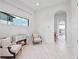 Inviting sitting area featuring a modern fireplace, tiled flooring, and comfortable seating at 4071 Isabella Cir, Windermere, FL 34786