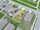 Aerial view of a backyard with a solar panel installation on the roof at 440 Patricia Alford Dr, Haines City, FL 33844