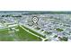 Aerial view of a planned community with a playground in Florida at 440 Patricia Alford Dr, Haines City, FL 33844