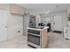 Bright, spacious kitchen with a modern island cooktop and stainless steel appliances at 4546 Malibu St, Orlando, FL 32811
