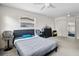 Spacious main bedroom featuring neutral walls, ceiling fan, and ample closet space at 4546 Malibu St, Orlando, FL 32811