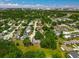 Neighborhood aerial showcasing residences with mature landscaping creating a private and inviting atmosphere at 4901 Lindsay Ct, Orlando, FL 32821