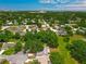 Expansive aerial view of the neighborhood with lush greenery, showcasing the area's tranquil and suburban charm at 4901 Lindsay Ct, Orlando, FL 32821