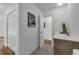This bathroom has a marble tile floor and a single sink vanity with a modern faucet at 4901 Lindsay Ct, Orlando, FL 32821
