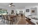 Spacious living area featuring tile floors, neutral decor, and seamless flow to the dining room at 4901 Lindsay Ct, Orlando, FL 32821