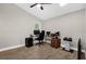 Functional home office with a vaulted ceiling, bright natural light, and space for two workstations at 5 W Village Dr, Oviedo, FL 32765