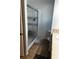 Tiled bathroom with a glass shower enclosure and modern fixtures at 5054 Mcdonald Rd, Zellwood, FL 32798
