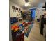 bedroom decorated with a loft bed, themed rug, and blue accents at 5054 Mcdonald Rd, Zellwood, FL 32798