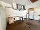 Spacious garage featuring work area, sink, pegboard, and storage, ideal for hobbies or projects at 563 Pleasant Grove Dr, Winter Springs, FL 32708