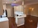 Kitchen featuring white cabinets, quartz countertops, and stainless steel appliances at 563 Pleasant Grove Dr, Winter Springs, FL 32708