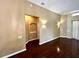 Open-concept living room with hardwood floors, neutral paint, and recessed lighting at 563 Pleasant Grove Dr, Winter Springs, FL 32708