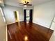 Spacious main bedroom featuring hardwood floors, neutral paint and plenty of natural light at 563 Pleasant Grove Dr, Winter Springs, FL 32708