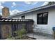 Charming exterior of home with decorative mosaic tile and outdoor seating at 6327 Ridgeberry Dr, Orlando, FL 32819