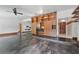 Living room features a custom wood built-in bar area with cabinetry, open shelving, and accent lighting at 6327 Ridgeberry Dr, Orlando, FL 32819