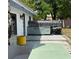 Outdoor kitchen and patio area with grill, counter space, and shaded seating at 6327 Ridgeberry Dr, Orlando, FL 32819