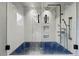 Contemporary shower features waterfall, blue basin, glass enclosure, and modern fixtures at 6327 Ridgeberry Dr, Orlando, FL 32819