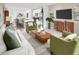 Open concept living room with lots of natural light, neutral paint, modern decor and comfortable seating at 658 Pennywort St, Lake Alfred, FL 33850