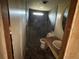 View of bathroom with tiled shower, toilet, vanity, and tiled flooring at 749 Saddlewood Blvd, Lakeland, FL 33809
