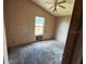 View of bedroom with carpeted floor, ceiling fan, and window at 749 Saddlewood Blvd, Lakeland, FL 33809