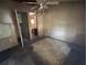 Bedroom featuring stained walls, stained carpet and view of bathroom at 749 Saddlewood Blvd, Lakeland, FL 33809