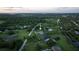Waterfront property with large lawn and mature trees at 775 Bay Dr, New Smyrna Beach, FL 32168