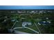Large lot with a well-maintained home surrounded by lush vegetation and mature trees at 775 Bay Dr, New Smyrna Beach, FL 32168