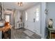 Inviting entryway with stylish flooring, white double doors, and decorative accents at 775 Bay Dr, New Smyrna Beach, FL 32168