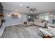 Comfortable living room with plush seating, accent lighting, and neutral decor at 775 Bay Dr, New Smyrna Beach, FL 32168