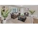 Cozy living room with neutral tones, plantation shutters and a comfortable seating arrangement at 8134 Hook Cir, Orlando, FL 32836