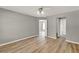 Spacious bedroom features wood floors and neutral paint, providing a blank canvas for personalization at 840 Baybreeze Ln, Altamonte Springs, FL 32714