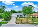 Attractive single-Gathering home with mature trees, well-manicured lawn, and attached garage in a serene setting at 840 Baybreeze Ln, Altamonte Springs, FL 32714