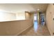 Spacious hallway with tile flooring leading to bedrooms and living areas at 8930 Zurich Ln, Kissimmee, FL 34747