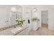 Bathroom featuring double sinks, granite countertops, and tiled shower at 9425 Holliston Creek Pl, Winter Garden, FL 34787